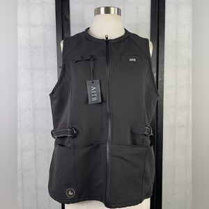 AITB dog training vest with multiple pockets and adjustable straps.